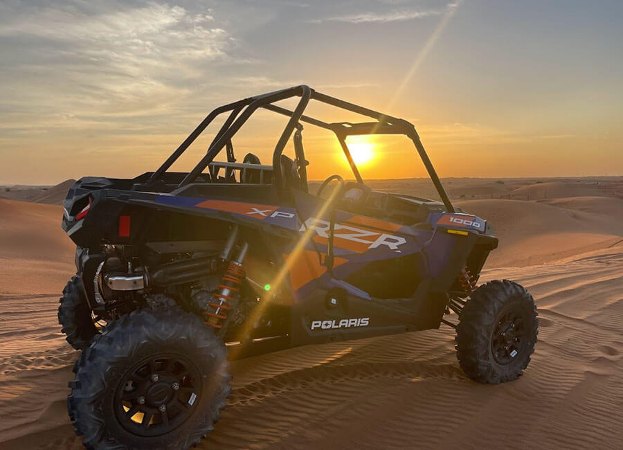 7-polaris-rzr-1000cc-side-view-sandy-desert-track